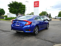 This Aegean Blue Metallic 2021 Honda Civic LX Sedan boasts a sleek profile and impressive fuel effic... (image 4)