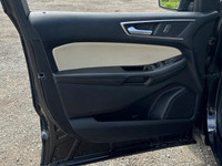 Up for sale is a well-maintained 2019 Ford Edge SEL, featuring a sleek black exterior and a rare tan... (image 9)