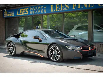 2015 BMW i8 Coupe One of BMWs most technologically advanced cars, the i8 is a two-door, four-seater...
