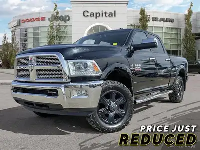The 2014 Ram 3500 Laramie is a heavy-duty pickup truck that blends robust capability with a comforta...