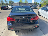 2017 BMW M3 Base 3.0L I6 4D Sedan RWD Azurite Black Metallic 6 Speed Manual Active Blind Spot Detect... (image 4)