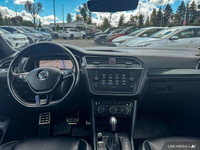 This Volkswagen Tiguan boasts a Intercooled Turbo Regular Unleaded I-4 2.0 L/121 engine powering thi... (image 9)