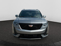 This 2025 Cadillac XT6 in Argent Silver Metallic is equipped with AWD and Gas V6 3.6L/ engine. Exclu... (image 7)