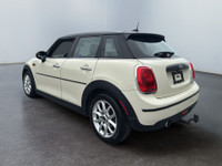 Decouvrez le plaisir de conduire a l’europeenne avec cette Mini Cooper Hardtop 2018 au design iconiq... (image 4)