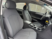 This 2016 Hyundai Sonata is a reliable sedan with a sleek gray exterior and a spacious interior in a... (image 7)
