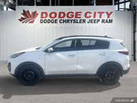 This Kia Sportage delivers a Intercooled Turbo Regular Unleaded I-4 2.0 L/122 engine powering this A... (image 1)