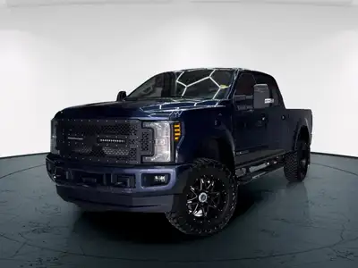 The 2019 Ford Super Duty F-350 SRW Lariat, in a striking blue with a 44 drivetrain, offers exception...