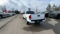 This Toyota Tacoma is equipped with: Fabric Seat Trim, AM/FM radio, 7 Inch Colour Touch Screen, Exte... (image 7)