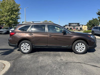 This 2019 Subaru Outback Touring SUV boasts a stunning Cinnamon Brown Pearl exterior and offers the... (image 3)