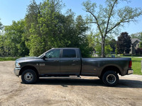 Tough, reliable, and built to handle anything you throw its way — this 2017 Ram 3500 SLT Dually with... (image 2)
