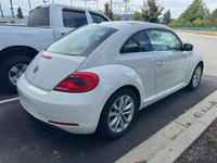 This Volkswagen Beetle Coupe delivers a Intercooled Turbo Regular Unleaded I-4 1.8 L/110 engine powe... (image 2)