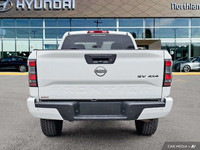 Experience the robust capability and smooth ride of this 2023 Nissan Frontier Extended Cab Pickup. T... (image 3)