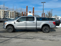 This 2023 Ford F-150 XLT has an Iconic Sliver Metallic exterior and Black Sport cloth seats with sea... (image 1)