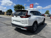 This 2021 Honda CR-V Sport SUV boasts impressive all-wheel drive capability, perfect for navigating... (image 4)