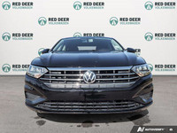 The pre-owned *2019 Volkswagen Jetta Comfortline* is a stylish and practical sedan built for drivers... (image 2)