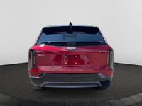 This 2025 Cadillac OPTIQ in Radiant Red Tintcoat is equipped with AWD and Electric engine. Check out... (image 3)