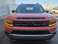 Adventure meets attitude in the 2026 Honda Passport TrailSport Touring Blackout—a rugged SUV that co... (image 1)