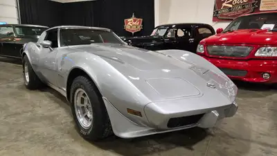 1978 Chevrolet Corvette 25th Anniversary Edition. Silver paint, Rally slotted alloy wheels, and spec...