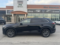 Elevate your drive with the 2023 Mazda CX-9 GS, a three-row SUV that combines luxury, performance, a... (image 1)