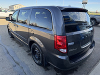 A get-it-done machine, our 2017 Dodge Grand Caravan Canada Value Package Minivan displayed in Granit... (image 2)