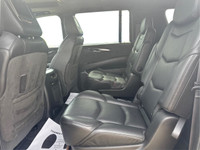 The 2016 Cadillac Escalade ESV Platinum in White combines robust 4×4 capabilities with luxurious dri... (image 9)