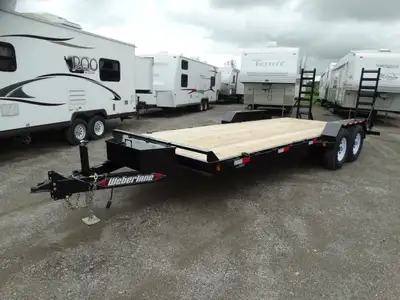 Come take a look at this 20in. equipment trailer. This trailer has tandem 7000 lb drop axles with el...