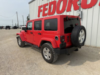 This well above average condition Jeep Wrangler Unlimited Sahara 4WD includes a 3.6L V6, heated leat... (image 1)