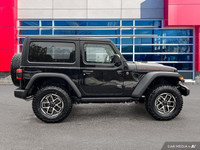 This Jeep Wrangler has a trusty Regular Unleaded V-6 3.6 L/220 engine powering this Manual transmiss... (image 7)