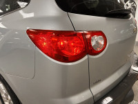 An ideal blend of size, comfort, and performance, our 2011 Chevrolet Traverse 2LT AWD shown in Silve... (image 9)