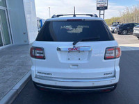The 2016 GMC Acadia SLE is a versatile and family-friendly SUV, presented in a clean Summit White ex... (image 5)