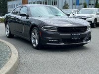 This 2018 Dodge Charger SXT has a Grey Exterior and Cream Interior with seating for 5. Equipped with... (image 9)
