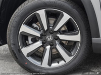 The all new 2025 Honda Pilot Touring: Elevate Your Drive.Experience the pinnacle of automotive excel... (image 8)