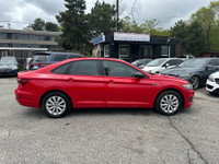 C ome by and check out this eye-catching 2019 Volkswagen Jetta Highline with a bold red exterior and... (image 4)