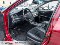 Finished in a Ruby Flare Pearl exterior that complements the Black leather/cloth interior, standing... (image 9)