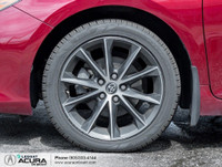 Finished in a Ruby Flare Pearl exterior that complements the Black leather/cloth interior, standing... (image 3)