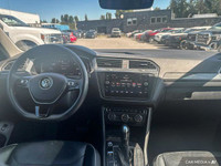 This Volkswagen Tiguan delivers a Intercooled Turbo Regular Unleaded I-4 2.0 L/121 engine powering t... (image 9)