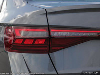 The 2025 Volkswagen Jetta Highline in a sophisticated gray hue comes equipped with a front-wheel dri... (image 9)