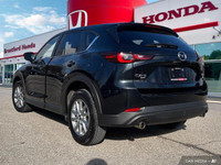 Experience the confident handling and sleek style of this 2024 Mazda CX-5 GS. Boasting a low 35,730k... (image 3)