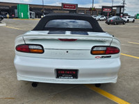 Unleash raw American muscle this summer with this stunning 2002 Chevrolet Camaro Z28 Convertible. Po... (image 8)