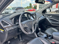 Command attention in this sleek 2015 Hyundai Santa Fe Sport Limited, boasting a luxurious Titanium S... (image 9)