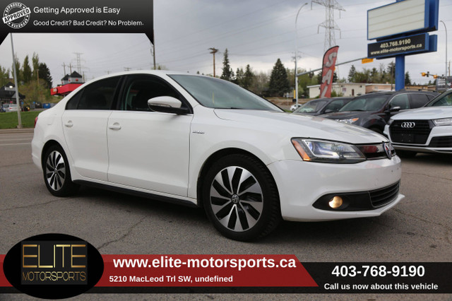 2013 VOLKSWAGEN JETTA SEDAN RARE HYBRID 4dr TSI DSG CLEAN CARFAX in Cars & Trucks in Calgary