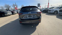 This Mazda CX-5 is equipped with: Leather Seat Upholstery, Power moonroof, Heated front seats, Heate... (image 9)