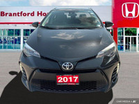 This 2017 Toyota Corolla SE boasts a sleek Slate Metallic exterior and a comfortable BLACK SOFTEX LE... (image 8)