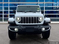 This Jeep Wrangler has a trusty Regular Unleaded V-6 3.6 L/220 engine powering this Automatic transm... (image 9)