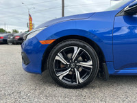 Come by and check out this sleek and stylish 2017 Honda Civic Touring! This top-of-the-line trim del... (image 8)