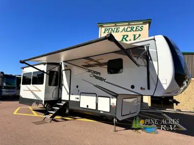 Forest River Cedar Creek fifth wheel 311RL highlights: Rear Living Area Washer & Dryer Slide Out top...