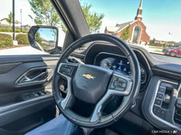 The 2022 Chevy Tahoe 4WD includes leather seating, heated front seats, heated mirrors, and tri-zone... (image 9)