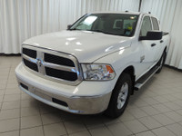 Drive our 2022 RAM 1500 Classic Tradesman Crew Cab 4X4 in Bright White and start taking care of busi... (image 3)