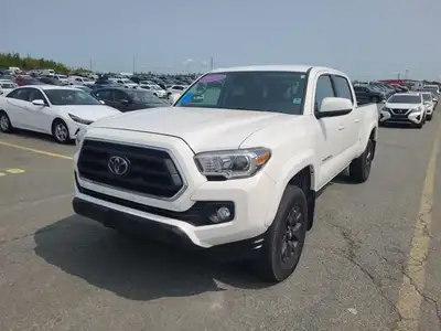 Recent Arrival! Odometer is 9163 kilometers below market average! 2023 Toyota Tacoma Ice Cap 4WD. 3....