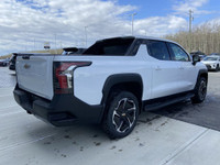 The 2025 Chevrolet Silverado EV Extended Range LT in Summit White is a groundbreaking and capable al... (image 8)